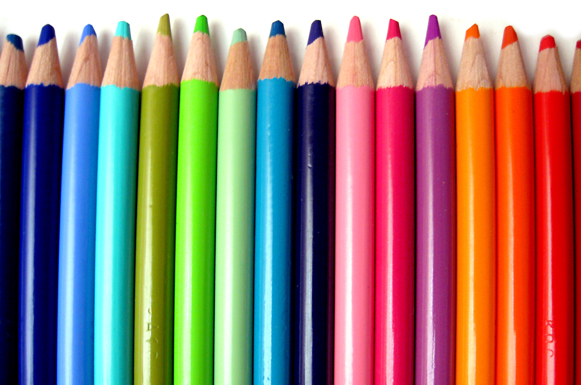 Colorful wooden pencils in line.